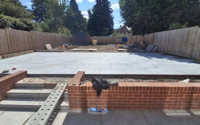 Raised Porcelain Patio with Sleeper Surrounds in Chelmsford